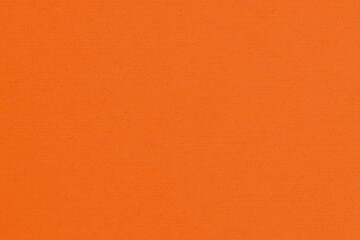 Naklejka premium The surface of orange cardboard. Paper texture with cellulose fibers. Background with elegant tint.