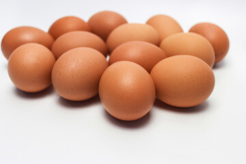 Close-Up of Fresh Raw Chicken Eggs on a White Background