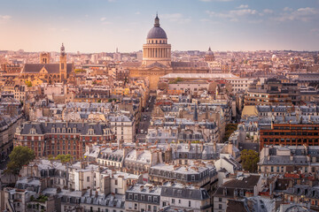 Fototapeta na wymiar Pantheon and quarter latin roofs at golden sunrise Paris, France