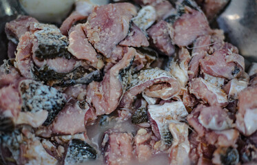 Sliced ​​fish, marinated, made into pickled fish, sold in the Amorn Fresh Food Market, Nakhon Naklua, Thailand