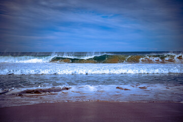 Beach waves crashing to shore