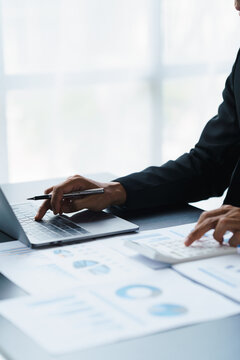 Businessmen working with graph data at office,Finance managers task,Concept business and finance