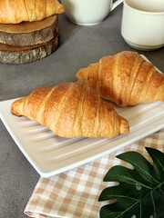 Breakfast Croissant, Coffee and Alarm Clock