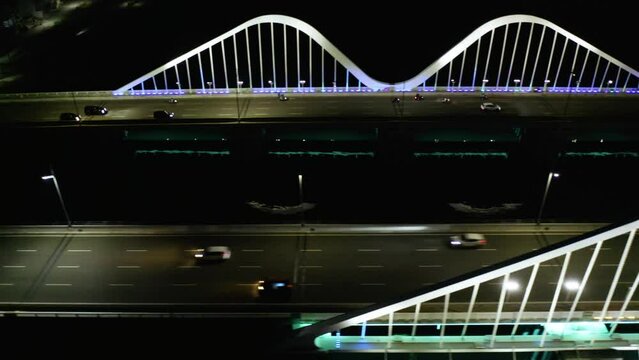 Night traffic on the reclamation PIK 2 bridge