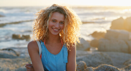 portrait attractive blonde woman on beach at sunset smiling enjoying summer travel lifestyle on vacation - Powered by Adobe
