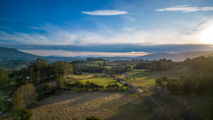 Afternoon winter sunlight over countryside in Tasmania