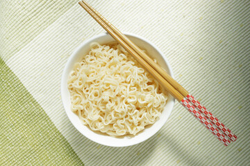 bowl of noodle with chopsticks