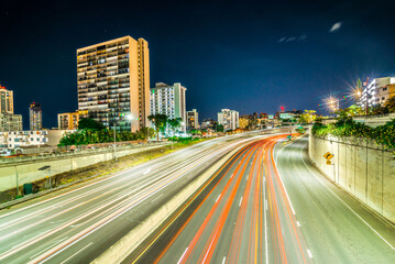Fototapeta na wymiar evening commute on H1 Freeway at night in honolulu hawaii