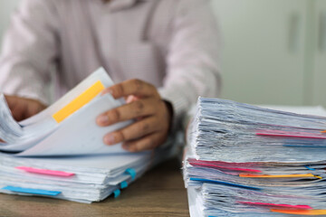 business administration and data documents on office desk, Stack of business overload paper.