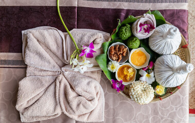 Natural thai aroma massage in thai spa Thai Spa aromatherapy. Massage spa body treatment aroma for healthy.Lifestyle Healthy Concept. female face healthy life luxury relaxation scrub treatment