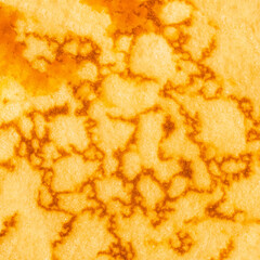 Pancake with caramel syrup as a textured background.  Pancakes Pattern.
