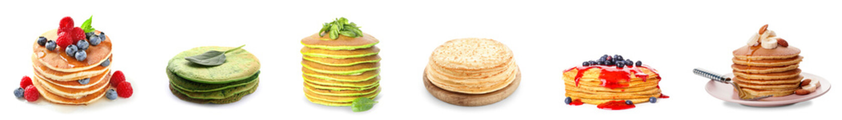 Assortment of sweet pancakes on white background