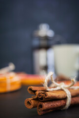 Fruit tea with apple, grapefruit and cinnamon on wooden background