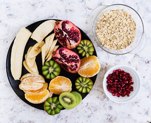 Healthy breakfast. Oatmeal with fruit on white background. Top view