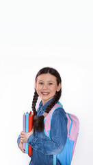 Happy teenage school child hold books white background, knowledge day. Back to school. Copy space.Vertical photo
