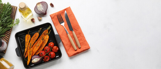 Frying pan with tasty prepared vegetables on light background with space for text