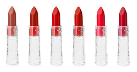 Set of beautiful lipsticks on white background