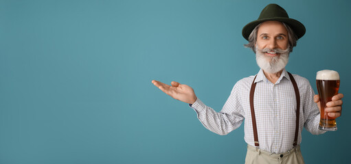 Funny man with big head, in traditional German clothes and with beer on blue background. Banner for Octoberfest