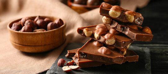 Sweet chocolate with hazelnut on table