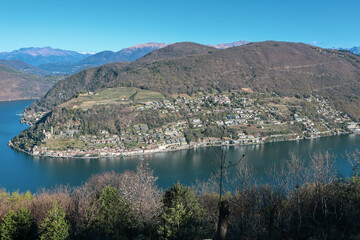 Fototapeta na wymiar The View to the Lake Lugano and the surrounding Mountains from Serpiano, Ticino, Switzerland