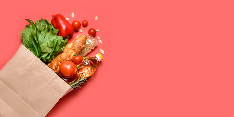 Paper bag with different products on red background with space for text