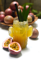 Passion Fruit tea on a wooden table closeup