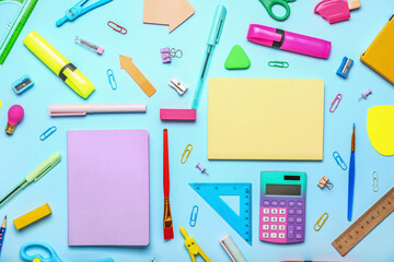 Different school stationery on blue background