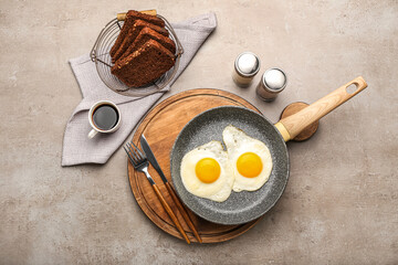 Composition with tasty breakfast and cup of coffee on grunge background