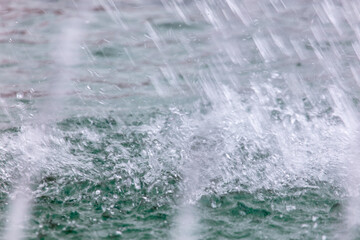 Splashes of jets of water in a fountain.