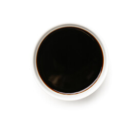 Bowl of soy sauce on white background