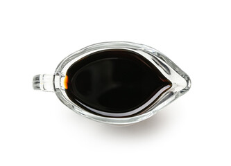 Gravy boat of soy sauce on white background