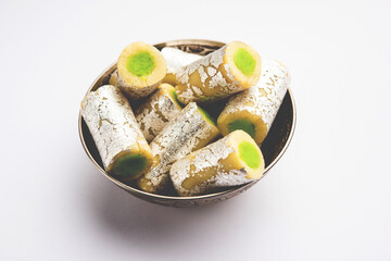 Kaju Pista Roll Or Cashew Pistachio Rolls Mithai or sigar, Indian sweet or dessert for festivals