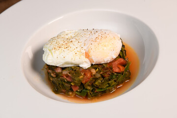 RECIPE OF CHICKEN FOUNDATION WITH TOMATOES, LEMON, ONION AND CHICKENED EGG. High quality photo