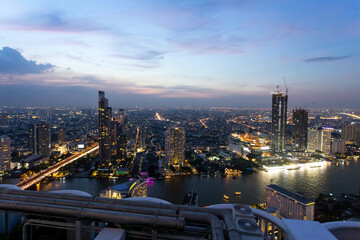 Fototapeta na wymiar Bangkok city and Chao Praya from Sky Bar Lebua at night
