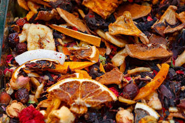 Close up of natural herbal tea made of various loose dried herbs