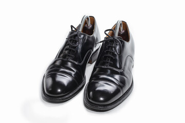 Footwear Concept. Pair of Stylish Classic Formal Male Stylish Black Polished Oxford Leather Laced Shoes Placed Together