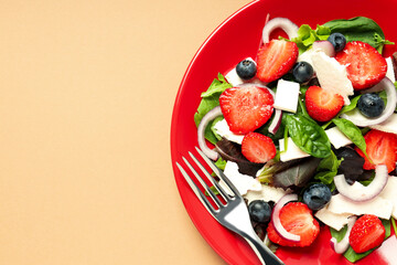 Concept of tasty salad, salad with strawberry, space for text