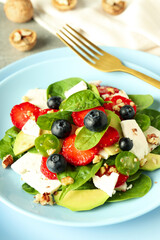 Concept of tasty salad, salad with strawberry, close up