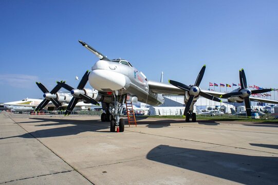 Soviet and Russian turboprop strategic bomber-missile carrier with turboprop engines Tupolev Tu-95MS (NATO: -  Bear) at stationary parking lot MAKS-2011. Close-up. Zhukovsky, Russia - August 17, 2011