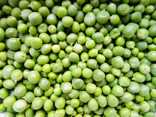 Harvested fresh green peas for cooking, background image