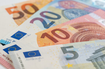 5, 10, 20, 50 euro banknotes. Money on white background