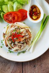 close up of crab with rice on the plate