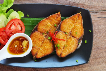 close up of fried fish on the plate