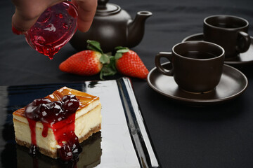 dessert cake cheesecake on a black plate
