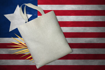 Patriotic tote bag mock up on background in colors of national flag. Liberia