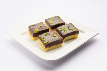 Choco Vanilla Pateesa or chocolate mawa barfi or or two layered burfi, Indian sweet or dessert