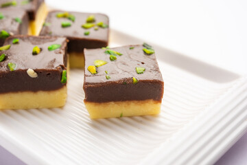 Choco Vanilla Pateesa or chocolate mawa barfi or or two layered burfi, Indian sweet or dessert