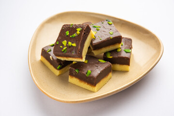 Choco Vanilla Pateesa or chocolate mawa barfi or or two layered burfi, Indian sweet or dessert