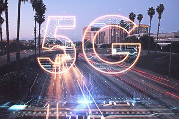 Fototapeta premium Creative 5G hologram on blurry night city background. Speed, internet and technology, communication concept. Double exposure.