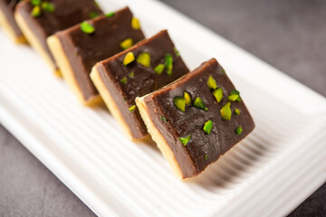 Choco Vanilla Pateesa or chocolate mawa barfi or or two layered burfi, Indian sweet or dessert